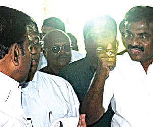 Transport Minister K N Nehru and Forest Minister N Selvaraj arguing (R) at a State-level exhibition in Tiruchy on Tuesday.