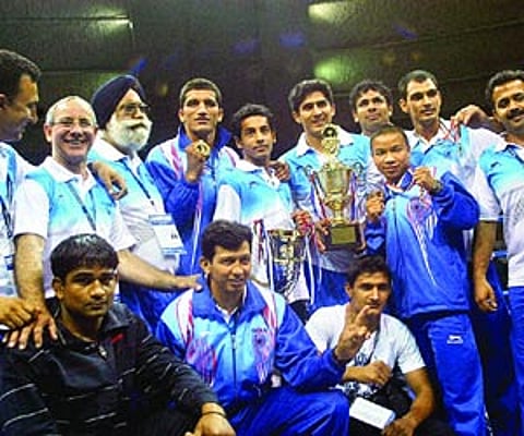 Indian boxers pose for a photo with their trophies and medals at Commonwealth Boxing Championship 2010. PTI