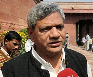 CPI (M) leader Sitaram Yechury talks to the media at Parliament House on the second day of the Budget session, in New Delhi - PTI Photo