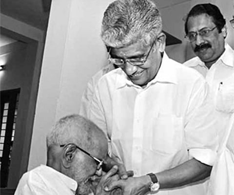 P K Narayana Panicker, who was elected president of the NSS, fondly kisses the hands of G Sukumaran Nair in Changanassery on Saturday | B P Deepu