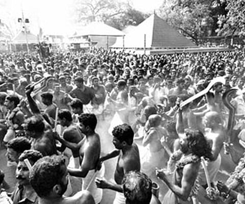 Devotees and oracles swarming the premises of Kodungallur Bhagavathy Temple as part of the ‘Kavu Theendal’ ritual on Sunday