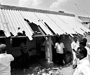 REARING ITS UGLY HEAD: A building that was damaged in a caste clash at Villoor village near Tirumangalam in Madurai district.