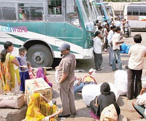 (Left) Cows loitering in the Kalasipalyam bus stand. (Right) Commuters waiting under the sweltering sun