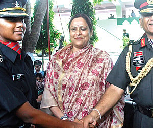 MAKING US PROUD: Army chief General V K Singh congratulating Divya Ajith Kumar at Officer’s Training Academy on Saturday. (ENS)