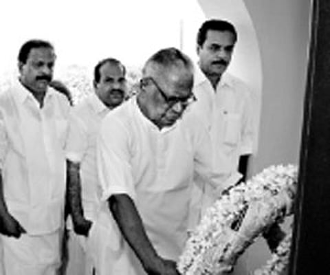 Chief Minister V S Achuthanandan offering floral tributes at the memorial column of Swadeshabhimani Ramakrishna Pillai on the Payyambalam Beach in K