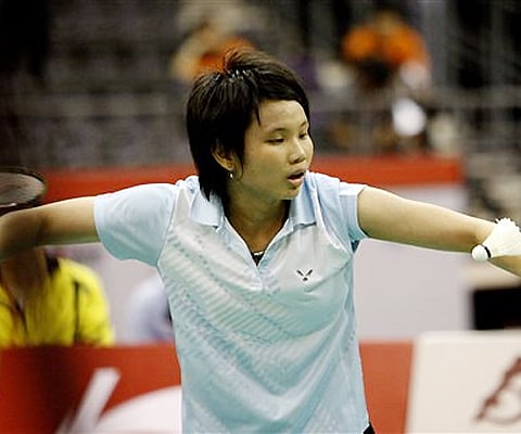 Tai Tzu Ying of Taiwan returns a shot to Saina Nehwal of India during the women's singles final at the Li-Ning Singapore Open Badminton Super Series on Sunday. AP