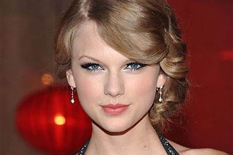 Recording artist Taylor Swift arrives at the 2010 BMI Country Awards in Nashville, Tenn. AP