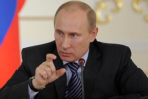 Olympic torch like Kalashnikov rifle: Putin