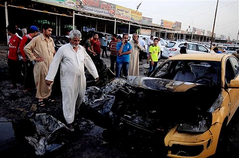 Bombs tear through Iraqi capital, killing over 60