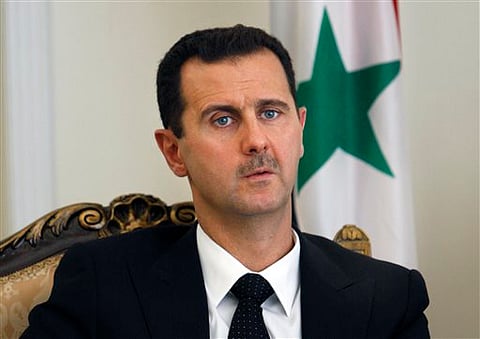 Defiant Syrian President rejected Western claims that his forces had deployed chemical weapons and challenged that Paris, London and Washington would have submitted evidences to the global public if they had any evidence for such claims. (AP/File)