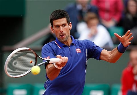 Djokovic beats Pella to reach 3rd round at French Open