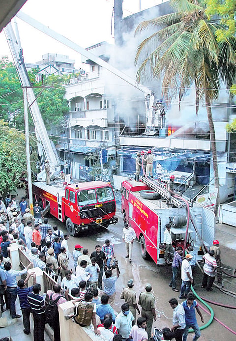 One dead as building catches fire
