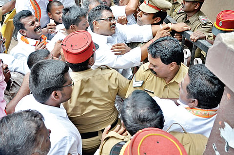 'No booze shops on temple lands'