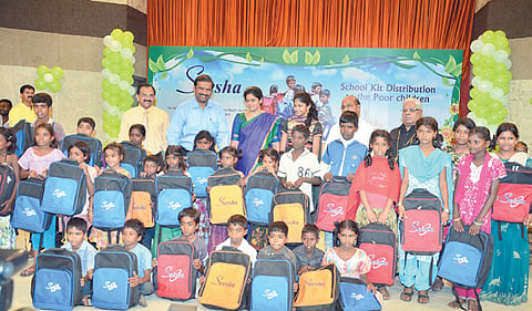 NGO distributes school kits to poor children