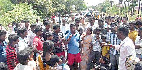 Villagers Fume Over Fire in Garbage Dump