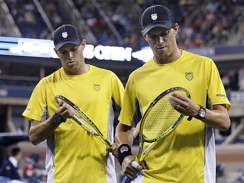 The top-seeded Bryans lost to 14th-seeded Dominic Inglot of Britain and Florin Mergea of Romania. AP