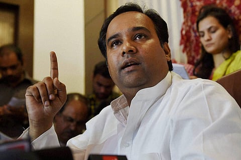 Sacked Delhi Minister Asim Ahmed Khan addressing a press conference in New Delhi on Saturday regarding the corruption charges against him. |PTI
