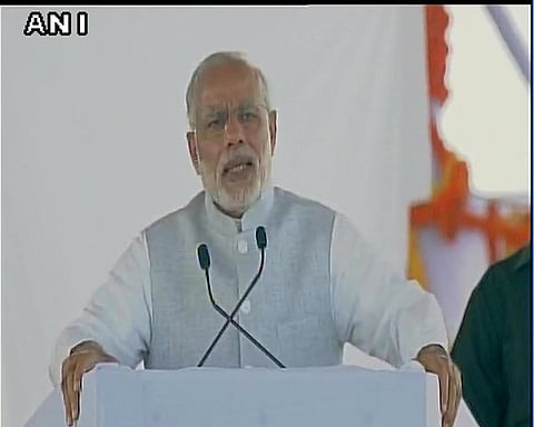 Prime Minister Modi Addressing the gathering at the foundation stone laying ceremony at Amaravathi. (ANI)