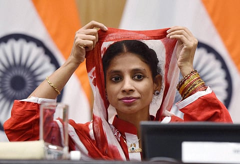 Geeta a deaf-mute Indian woman who accidentally crossed over to Pakistan more than a decade ago gestures at a press conference in New Delhi. (PTI)