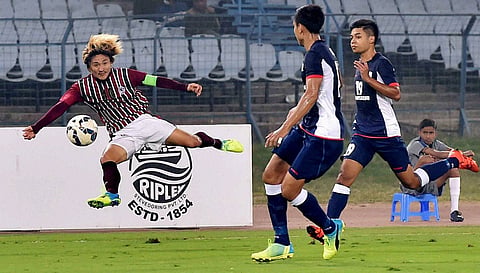 Mohun Bagan white maroon and Tampines Rovers Singapore players in action during AFC Champions League 2016 at Salt Lake in Kolkata. | PTI
