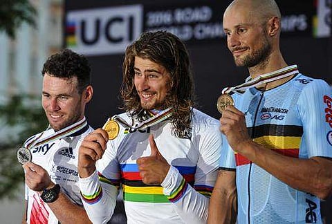 Gold medalist Peter Sagan of Slovakia, center, celebrates on the podium during the men's Elite Road Race, Doha(Photo|AP)