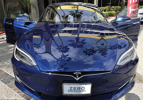 This Monday, Oct. 24, 2016, photo shows a Tesla Model S on display in downtown Los Angeles. Tesla Motors reports financial results Wednesday, Oct. 26, 2016. | AP