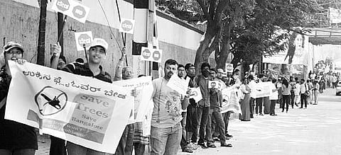 File photo of citizens protesting against the proposed steel flyover