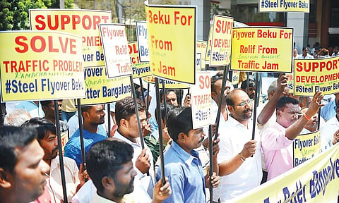 People from various residents’ associations and other forums protest in support of the steel flyover on Saturday | Pushkar V