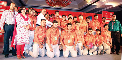 Quizmaster Soumyadip Chowdhury along with the prize winner Sai International School at 5th Odisha Literary Festival 2016 in Bhubaneswar on Sunday | Express