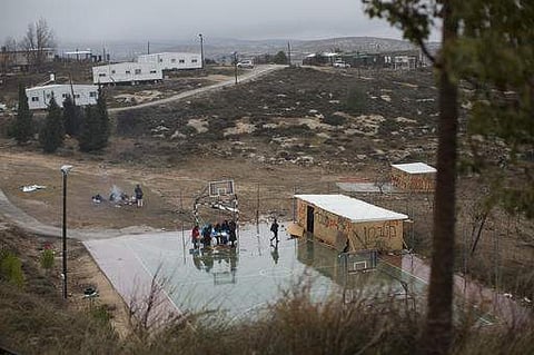 Jewish settlers in an unauthorized Israeli outpost in the West Bank. (File photo | AP)