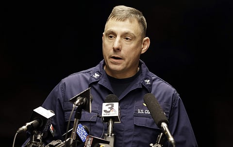 Capt. Michael Mullen of the U.S. Coast Guard answers questions during a news conference at Burke Lakefront Airport, Friday, Dec. 30, 2016, in Cleveland. | AP