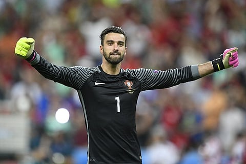 Portugal's goalkeeper Rui Patricio reacts after Portugal beat their hosts France 1-0 in the Euro 2016 final football match between France and Portugal at the Stade de France in Saint-Denis, north of Paris. |AFP