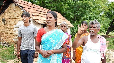 Ganapathy’s family in front of the one-roomed house where he grew up. | (D Sampathkumar | EPS)