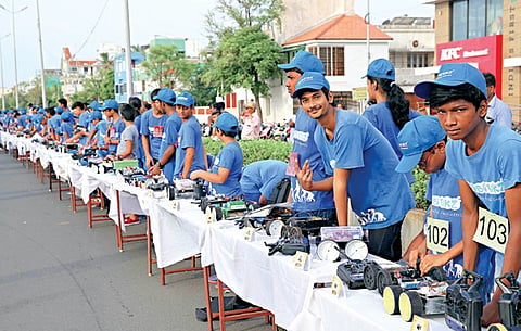 103 bots built by school kids set 'world record'