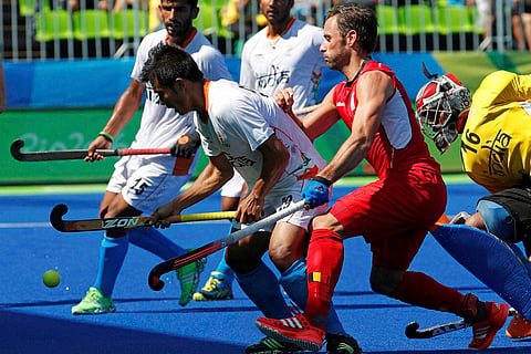 Belgium's Sebastian Dockier second from right tries to score past the defense of India during a men's field hockey quarter final match atthe 2016 Summer Olympics in Rio de Janeiro Brazil Sunday Aug. 14 2016. | AP