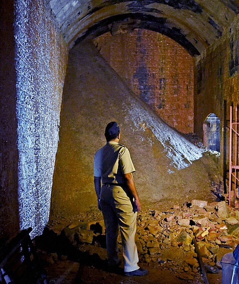 A police man in the 150-meter-long underground British era bunker, which had been closed for several decades, after it was opened by the Governor Ch Vidyasagar Rao inside the Raj Bhavan in Mumbai on Wednesday. (PTI)