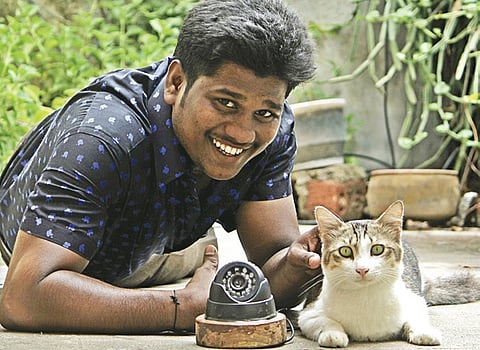 Take 1: Guy, cat and a CCTV camera