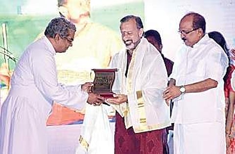 Percussionist K V Prasad being felicitated