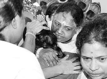 Mata Amritanandamayi blesses devotees during the Brahmasthanam Mahotsavam at Kaimanam Ashram | kaviyoor santhosh