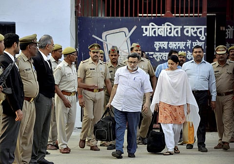Nupur and Rajesh Talwar coming out of the Dasna Jail in Ghaziabad on Monday after they were released following their acquittal.| PTI
