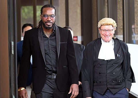 West Indies cricketer Chris Gayle leaves the New South Wales Supreme Court in Sydney. | AFP