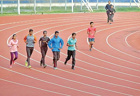 Athletes jogging at Kanteerava Stadium in Bengaluru on Saturday |JITHENDRA M