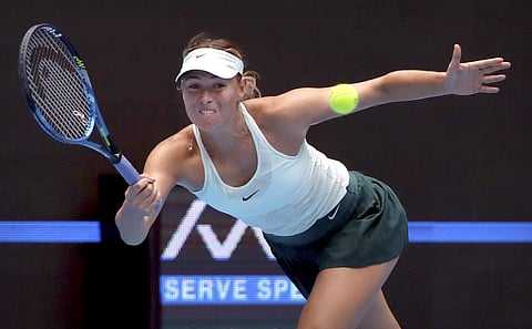 Maria Sharapova of Russia returns a shot against her compatriot Ekaterina Makarova in their women's singles match in the China Open tennis tournament at the Diamond Court in Beijing. | AP