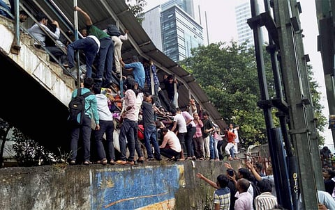 Passengers were caught in a stampede at Elphinstone railway station's foot over bridge in Mumbai. | (File photo by PTI)