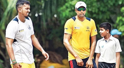 M Rangarajan (L) and R Ashwin at Chepauk on Thursday.| (D Sampathkumar | EPS)