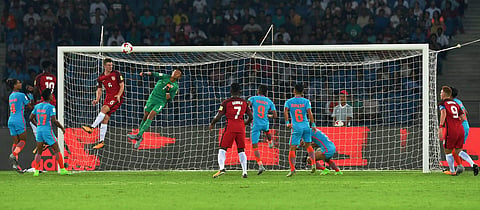 Indian goalkeeper Dheeraj Moirangthem saves a goal during their U-17 FIFA World Cup football match against USA.(Photo | AP)