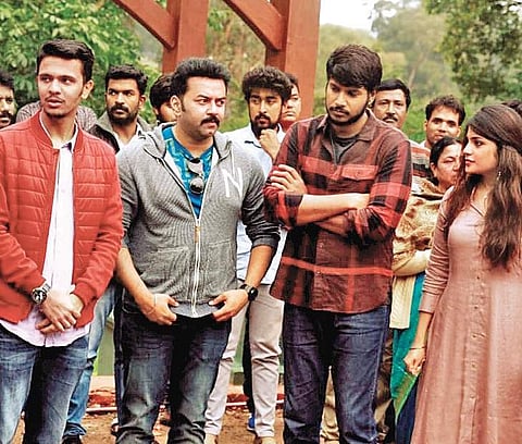Karthick Naren along with Sundeep and Aathmika