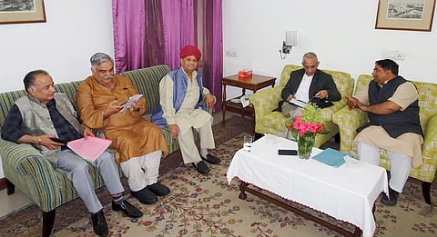 ammu Dineshwar Sharma the Centre's special representative for talks on Kashmir meeting with state BJP president Sat Sharma and other leaders in Jammu. (PTI Photo)