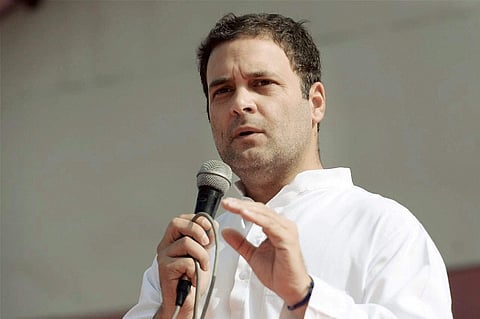 Congress vice president Rahul Gandhi addresses the supporters during a road show in Banaskantha distcrict of Gujarat on Sunday. | PTI