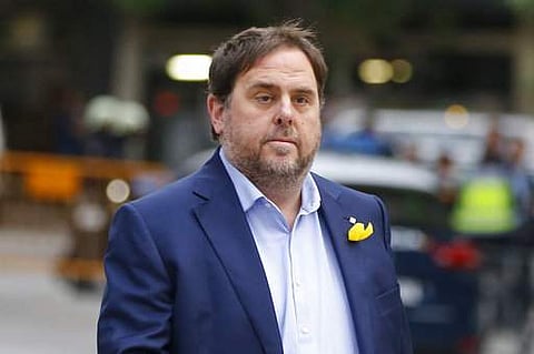 Former Catalan Vice President Oriol Junqueras arrives at the National Court for questioning by a National Court judge investigating possible rebellion charges, in Madrid, Spain. | AP